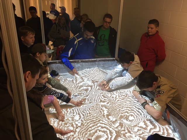 Kids playing in the AR Sandbox