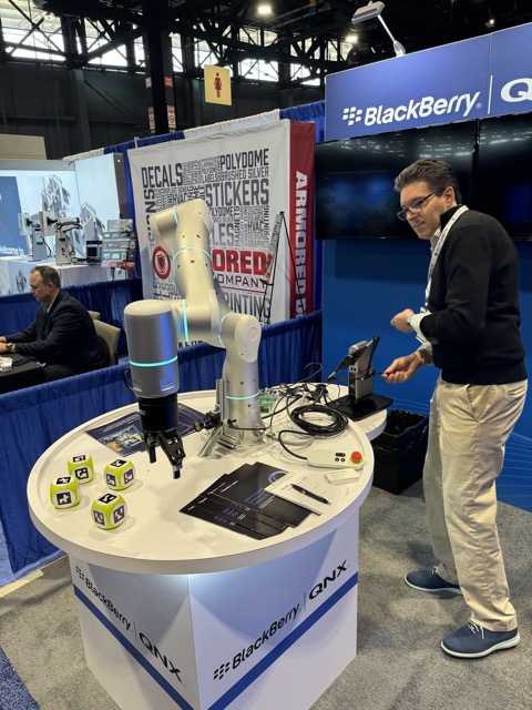 Visiting a booth at Automate 2024